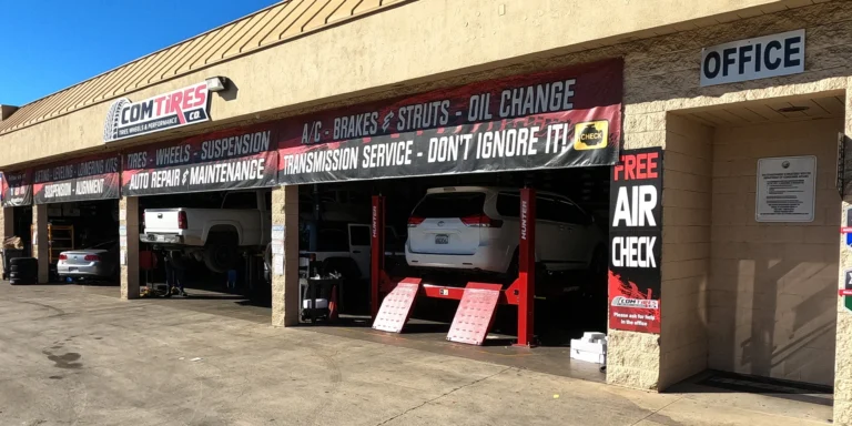 Comtires auto repair and tire shop exterior at 1113 W Holt Blvd Ontario CA