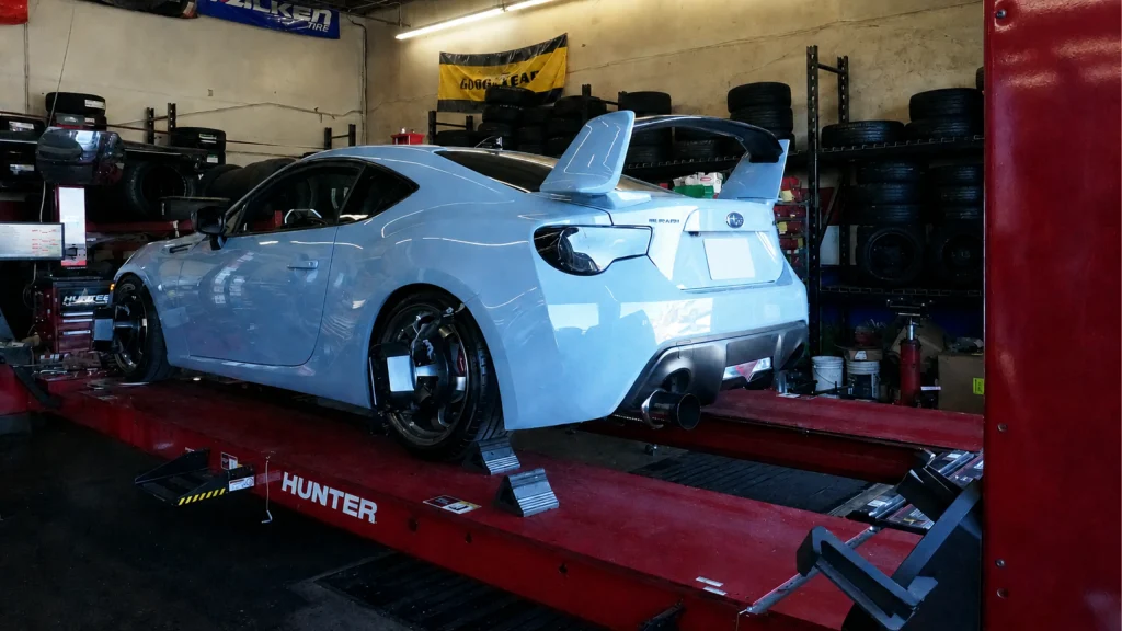 Performance tires on a sports car at an Ontario tire shop