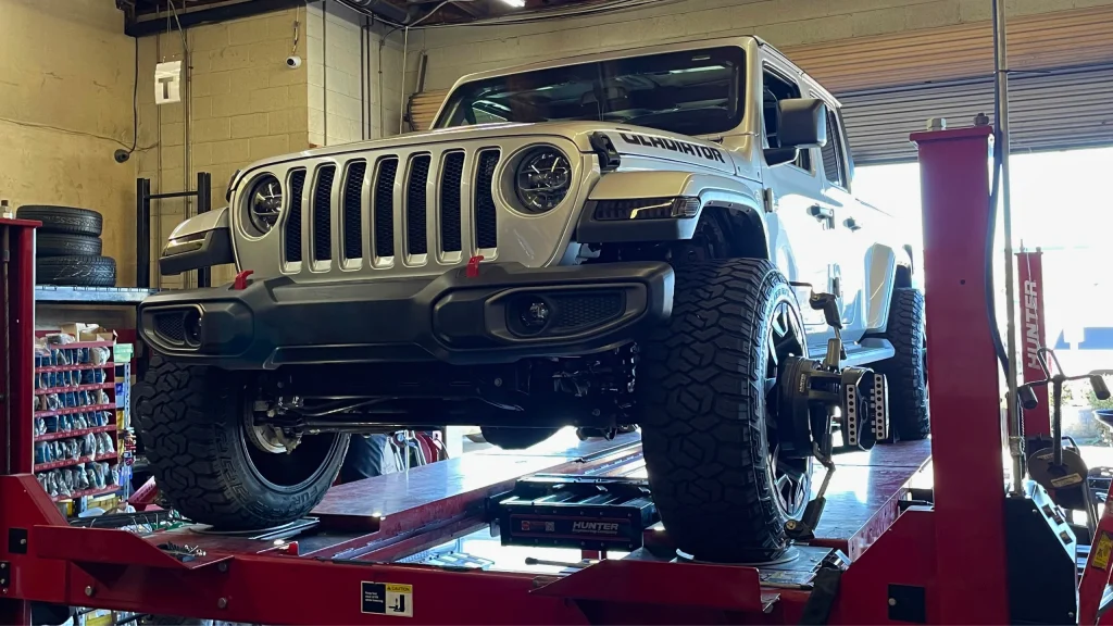 Vehicle undergoing wheel alignment inspection in Ontario CA