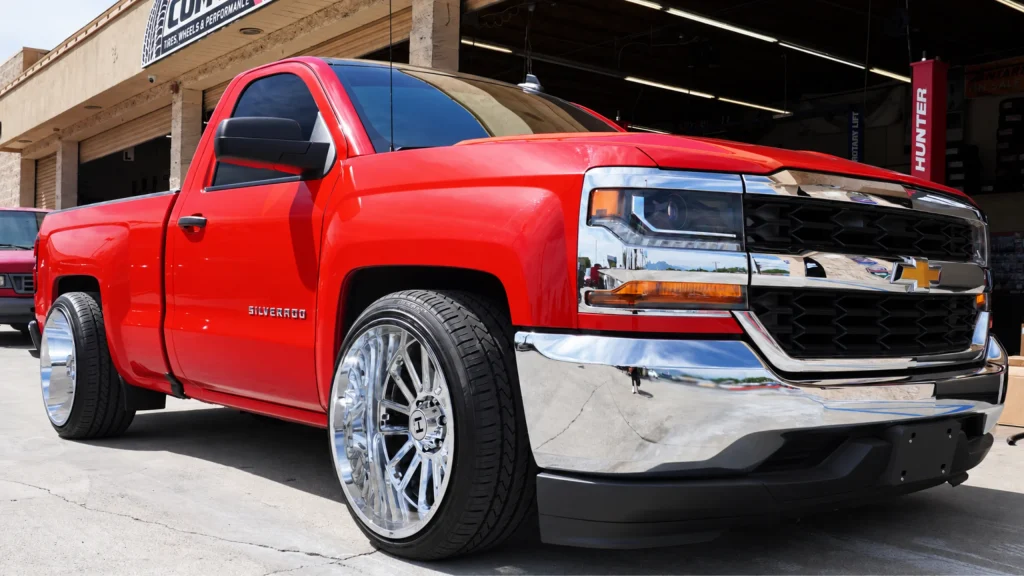 Pickup truck outside Comtires in Ontario, CA, where a technician can measure your tire tread